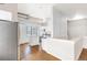 Modern kitchen with white cabinetry and stainless steel appliances at 70 W 6Th Ave # 109, Denver, CO 80204