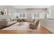 Inviting living room with modern furnishings, lots of natural light, and hardwood flooring at 70 W 6Th Ave # 109, Denver, CO 80204