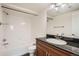 Neat bathroom featuring a bathtub, a toilet, and a single sink vanity at 9139 W 50Th Ln # 204, Arvada, CO 80002