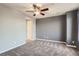 This bedroom boasts neutral carpet, a ceiling fan, and ample space for relaxation at 9139 W 50Th Ln # 204, Arvada, CO 80002