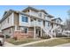 Inviting townhouse with a quaint staircase and charming combination of brick and siding at 9139 W 50Th Ln # 204, Arvada, CO 80002