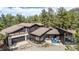 Aerial view of stunning home boasting a modern design with a stone facade and ample outdoor space at 37 Wagner Cir, Boulder, CO 80304