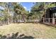 Expansive backyard featuring mature trees and a partially fenced yard, perfect for outdoor activities and relaxation at 37 Wagner Cir, Boulder, CO 80304