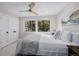 Cozy bedroom features a ceiling fan, double windows and neutral color scheme at 37 Wagner Cir, Boulder, CO 80304