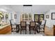 Dining room boasts a wooden table, lots of windows, and natural light at 37 Wagner Cir, Boulder, CO 80304