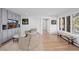 Relaxing living area with built-in shelving and hardwood floors at 37 Wagner Cir, Boulder, CO 80304