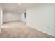 Spacious carpeted basement with recessed lighting and a window for natural light at 10443 W 84Th Pl, Arvada, CO 80005