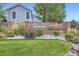 Elegant Lakecrest community sign surrounded by beautiful landscaping, showcasing the neighborhood's charm at 10443 W 84Th Pl, Arvada, CO 80005