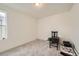 Bright bedroom with carpeted floor and large window at 677 Brookwood Dr, Lafayette, CO 80026