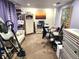 Finished basement featuring an office space with a sunset picture hanging on the wall at 13474 W 65Th Dr, Arvada, CO 80004