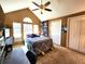 Vaulted ceiling bedroom with natural light and ample closet space at 13474 W 65Th Dr, Arvada, CO 80004