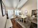 Inviting dining room with hardwood floors and bright natural light at 13474 W 65Th Dr, Arvada, CO 80004