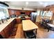 Spacious kitchen features an island and stainless steel appliances at 13474 W 65Th Dr, Arvada, CO 80004