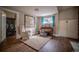 Relaxing basement area with piano and comfortable armchair at 408 Soda Creek Rd, Idaho Springs, CO 80452