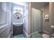 Modern bathroom with a shower and dark vanity at 408 Soda Creek Rd, Idaho Springs, CO 80452