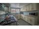 Modern kitchen with granite countertops and new appliances at 408 Soda Creek Rd, Idaho Springs, CO 80452