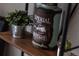 Rustic shelf decor with plants and vintage items at 408 Soda Creek Rd, Idaho Springs, CO 80452