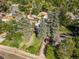 Aerial view of property with beautiful mature trees, offering shade and curb appeal at 2862 S Grant St, Englewood, CO 80113