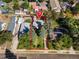 Aerial view of a property outlined in red, highlighting its location and proximity to nearby houses at 2862 S Grant St, Englewood, CO 80113