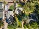 Aerial view of a property showcasing surrounding neighborhood and landscaping at 2862 S Grant St, Englewood, CO 80113