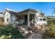 Charming cottage-style home featuring a welcoming front porch and quaint architectural details at 2862 S Grant St, Englewood, CO 80113