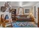 Comfortable living room with a brown couch and rustic decor at 2862 S Grant St, Englewood, CO 80113