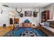 Spacious living room with a blue rug and rustic wood accents at 2862 S Grant St, Englewood, CO 80113