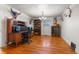 Home office setup with hardwood floors and a large desk at 2862 S Grant St, Englewood, CO 80113