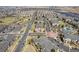 Expansive aerial shot of a residential area highlighting the neighborhood layout and community amenities at 5705 N Genoa Way # 206, Aurora, CO 80019
