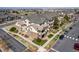 Beautiful condominium complex with brick accents and private balconies in a well-maintained community at 5705 N Genoa Way # 206, Aurora, CO 80019