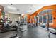 Bright community gym featuring a variety of exercise equipment, and large windows at 5705 N Genoa Way # 206, Aurora, CO 80019