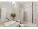 Clean bathroom with bathtub and updated vanity at 16058 E Geddes Ln # 26, Aurora, CO 80016