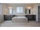 Spa-like bathroom features double vanities, a soaking tub, and modern fixtures at 3008 Blithe Pt, Castle Rock, CO 80108
