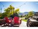 Relaxing patio with red chairs and mountain views at 2394 S Loveland Way, Lakewood, CO 80228