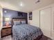 Bedroom with closet and colorful accent wall at 1475 Saint Paul St, Denver, CO 80206