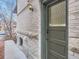 Exterior view featuring the front door and brick exterior at 1475 Saint Paul St, Denver, CO 80206