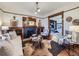 Comfortable living room featuring a fireplace, seating, and decor with an open layout at 1475 Saint Paul St, Denver, CO 80206