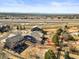 Aerial view of the home showing the large lot and proximity to highways at 23327 E Ottawa Dr, Aurora, CO 80016