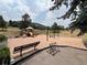 Community playground with swings and slides at 23636 Pondview Pl # C, Golden, CO 80401