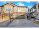 Beautiful townhome exterior with attached garage and inviting curb appeal at 10112 Bluffmont Ln, Lone Tree, CO 80124
