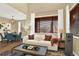 Open living space with view to dining area and windows with privacy blinds at 10112 Bluffmont Ln, Lone Tree, CO 80124