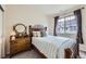 This bedroom is light and bright and has a large window offering great sunlight at 15362 W 66Th Ave # D, Arvada, CO 80007