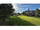 Expansive community green space perfect for recreation and relaxation with well-maintained landscaping and nearby homes at 15362 W 66Th Ave # D, Arvada, CO 80007
