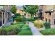 Professionally landscaped green space and walking path at 15362 W 66Th Ave # D, Arvada, CO 80007
