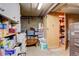 Unfinished basement offering ample storage space and potential for customization at 306 S Newport Way, Denver, CO 80224