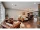 Spacious living room with hardwood floors and abundant natural light at 306 S Newport Way, Denver, CO 80224