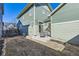 View of the backyard, showcasing the home's exterior and landscaping potential at 2572 Iola St, Aurora, CO 80010