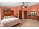 This bedroom offers an en-suite bath and a large closet with solid wood doors at 11485 Pecos St, Denver, CO 80234