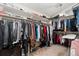 A large walk-in closet offers extensive shelving and hanging space for clothing and storage at 11485 Pecos St, Denver, CO 80234