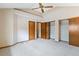 Vaulted ceiling bedroom with ample closet space offering abundant storage solutions at 2136 S Scranton Way, Aurora, CO 80014